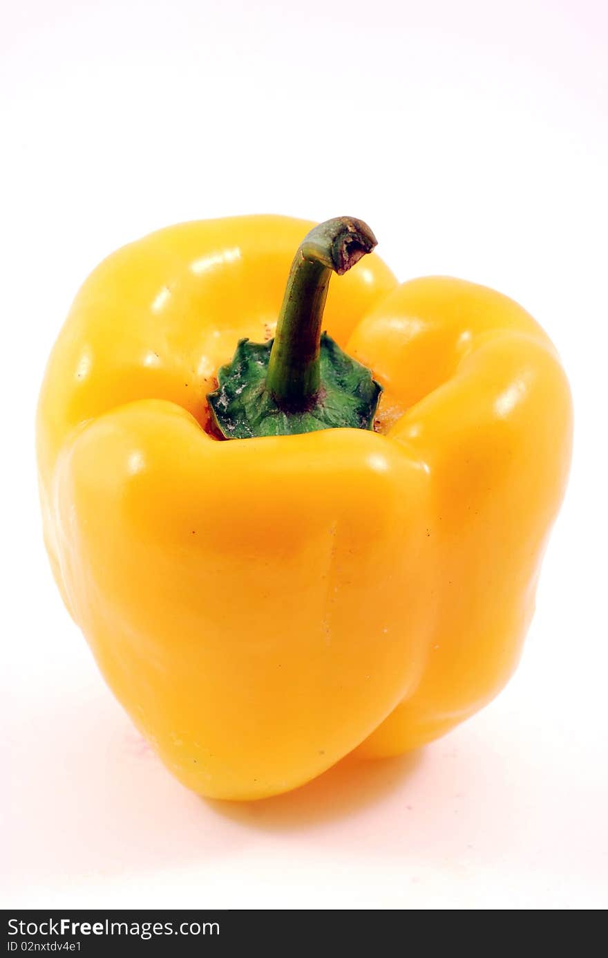 Yellow pepper on white background