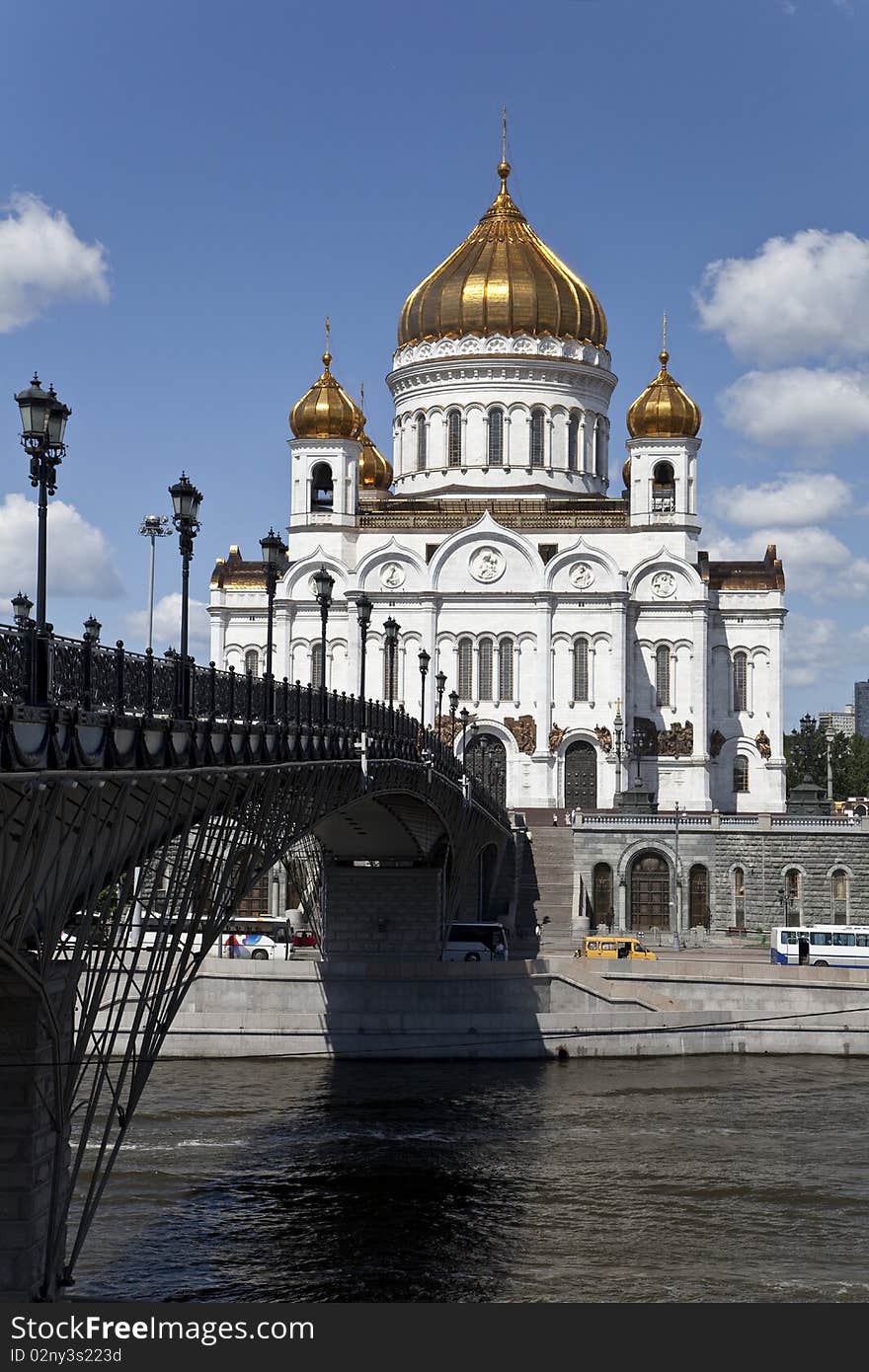 View of Christ the Savior Cathedral and Patriarchal Bridge from embankment of Moscow river. View of Christ the Savior Cathedral and Patriarchal Bridge from embankment of Moscow river