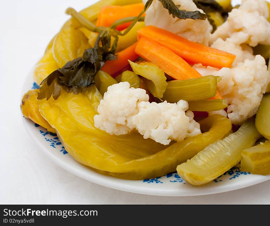 Close up photo of pickle in the plate