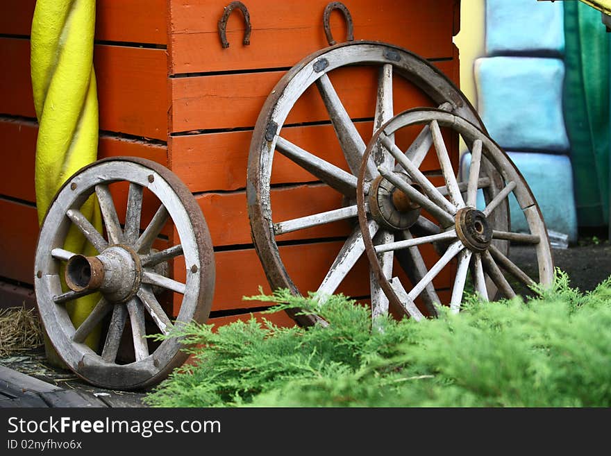 Old wooden wheels of the cart