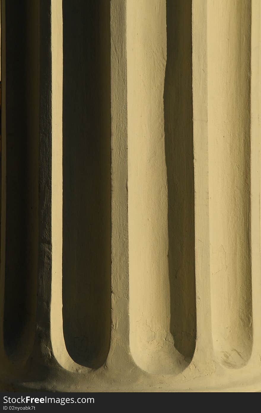 A column in the sunset with shadows. A column in the sunset with shadows