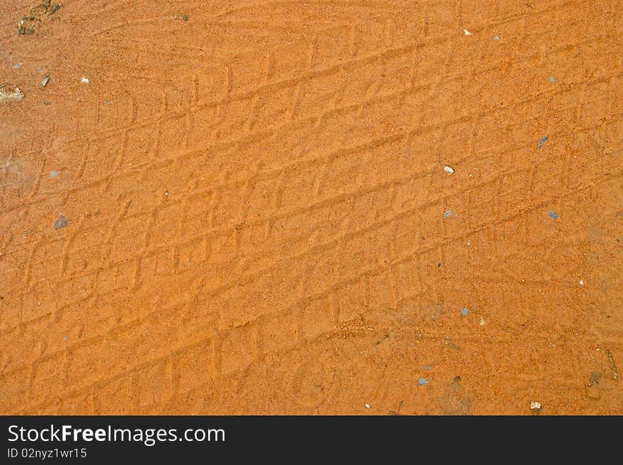 Texture of wheel on sand at floor