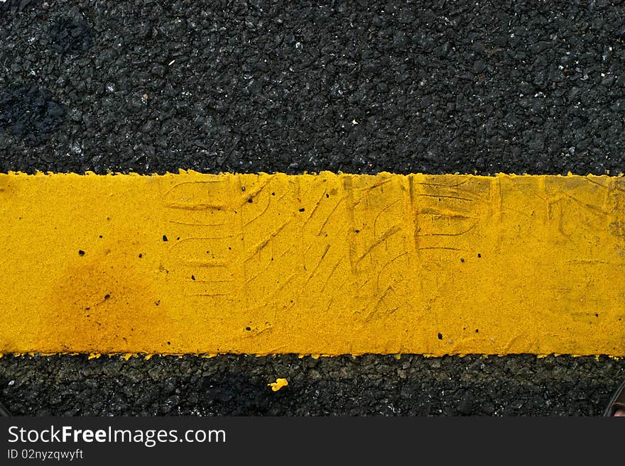 Texture on yellow line in car park