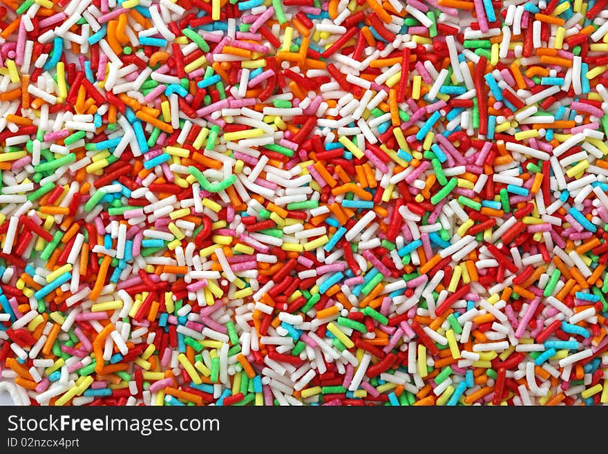 A lot of sprinkles as a background. A lot of sprinkles as a background