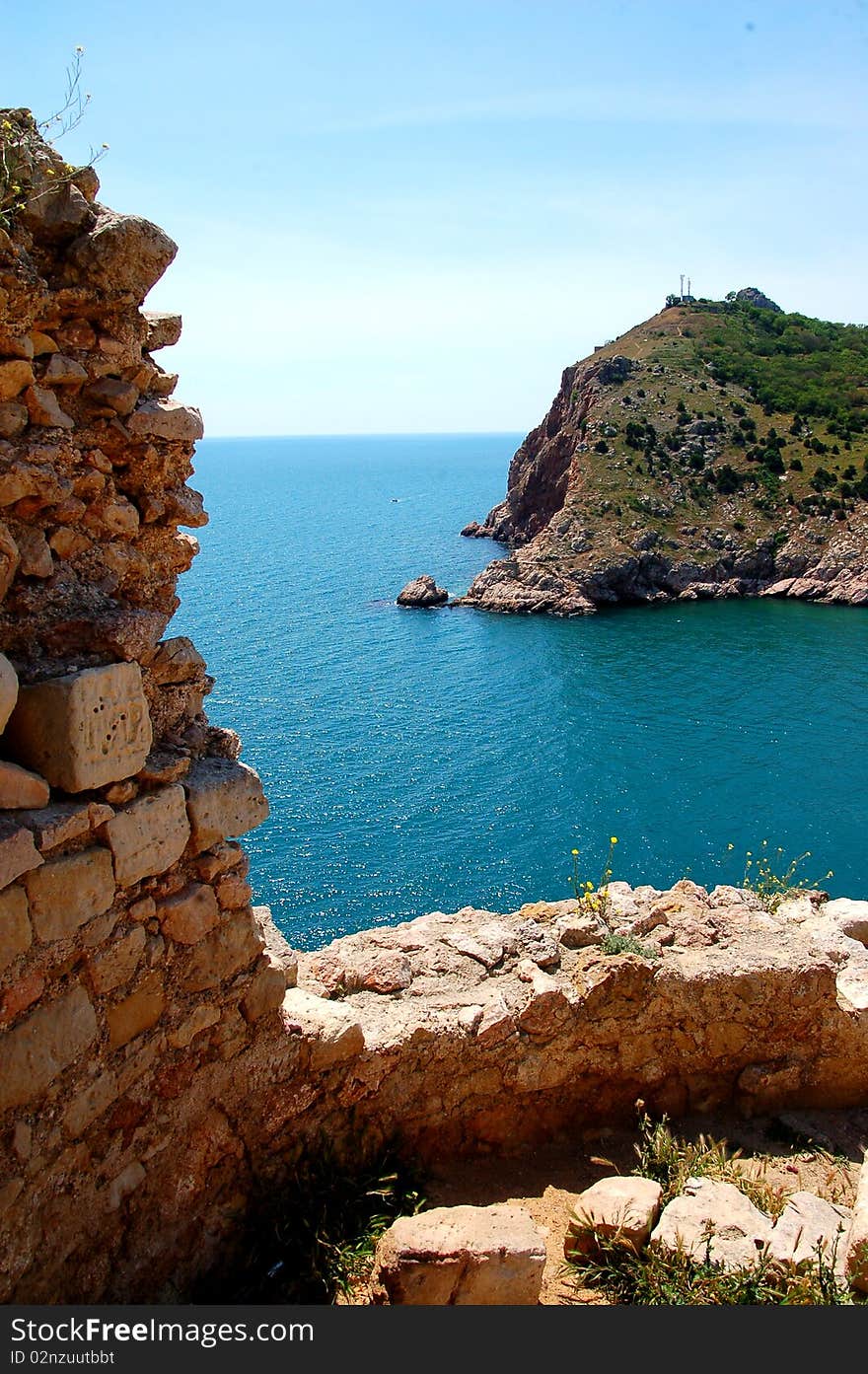 Rock-ribbed coast and the sea