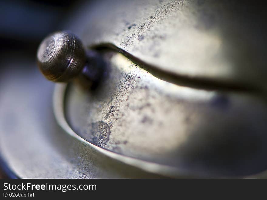 Macro shot of interesting metal  thing with patina