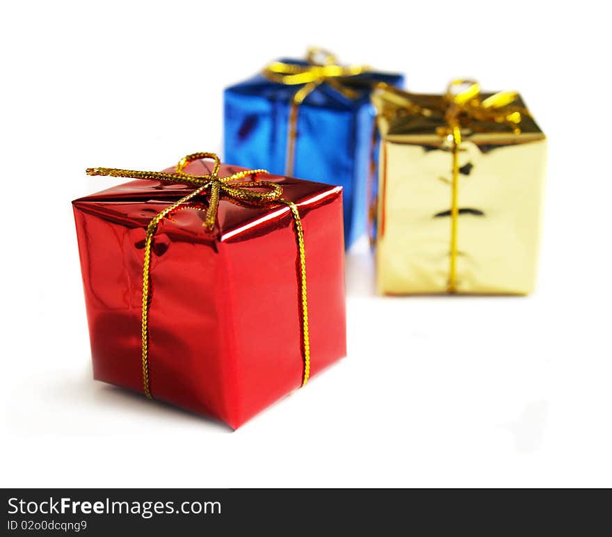 Small gift boxes on a white background. Small gift boxes on a white background