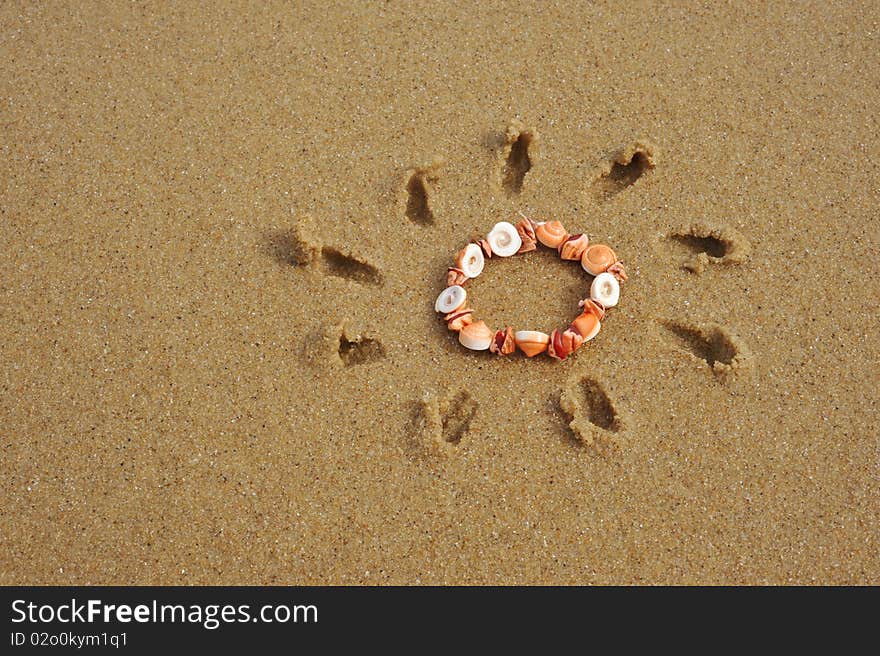 Close-up conch bracelet Sun symbol background. Close-up conch bracelet Sun symbol background