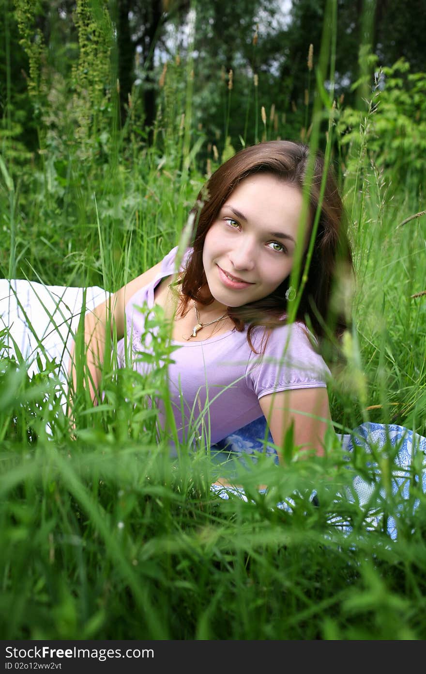 On a sunny summer day, very pleasant to lie on the grass. On a sunny summer day, very pleasant to lie on the grass