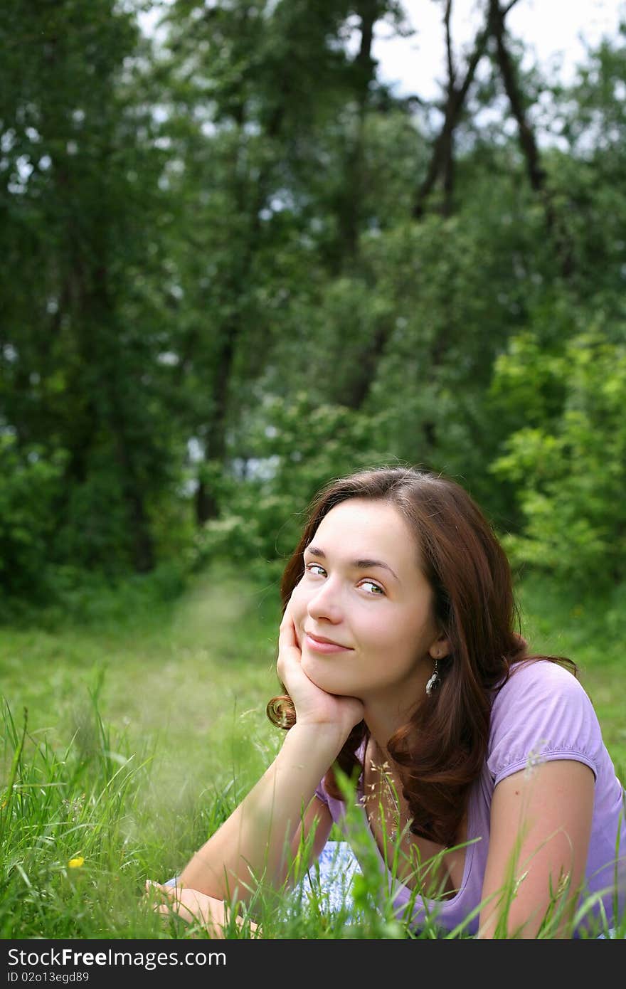 On a sunny summer day, very pleasant to lie on the grass. On a sunny summer day, very pleasant to lie on the grass