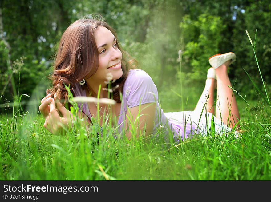 On a sunny summer day, very pleasant to lie on the grass. On a sunny summer day, very pleasant to lie on the grass