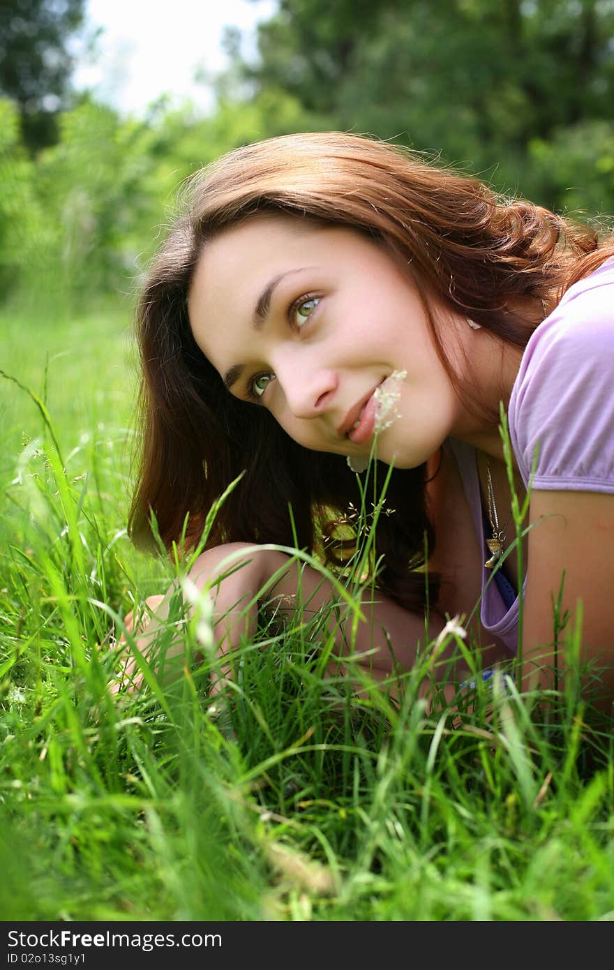 On a sunny summer day, very pleasant to lie on the grass. On a sunny summer day, very pleasant to lie on the grass