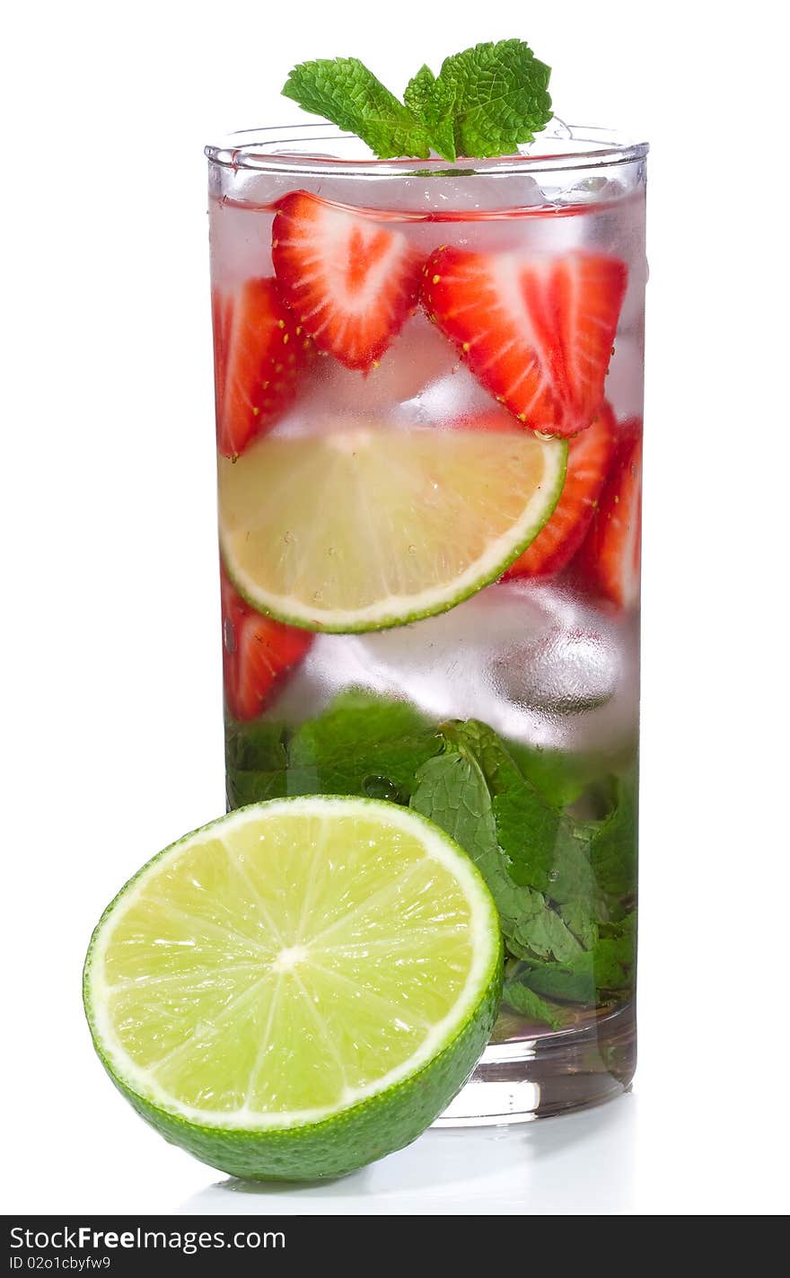 Cocktail with lime, strawberry and mint