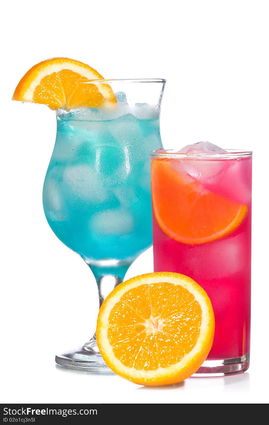 Blue and red cocktails with fruits on white background