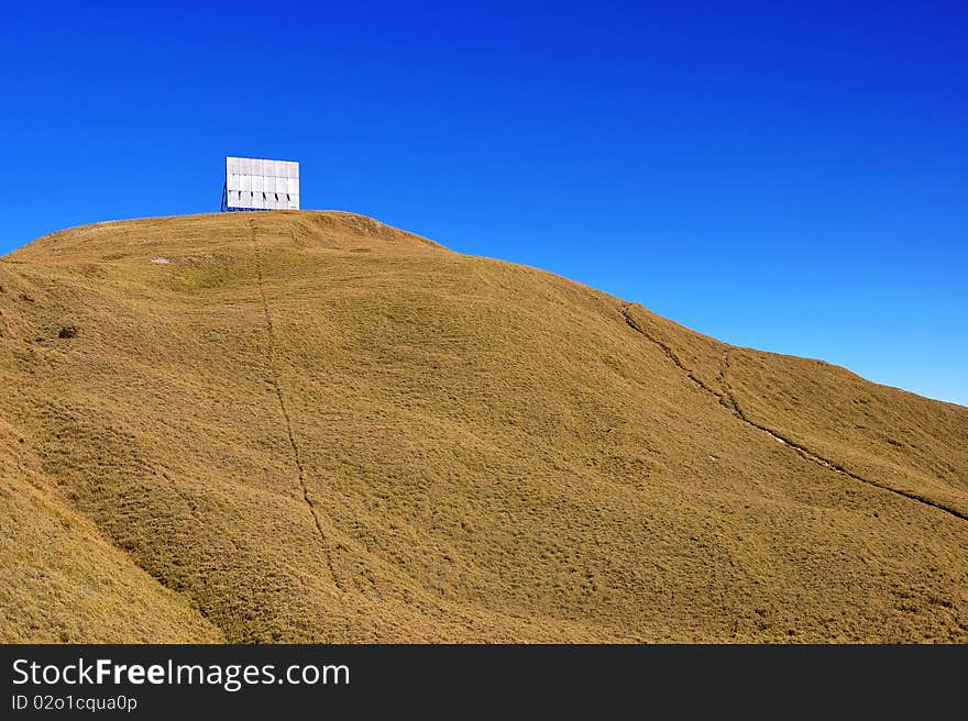 Ad billboard on a mountain peak. Ad billboard on a mountain peak