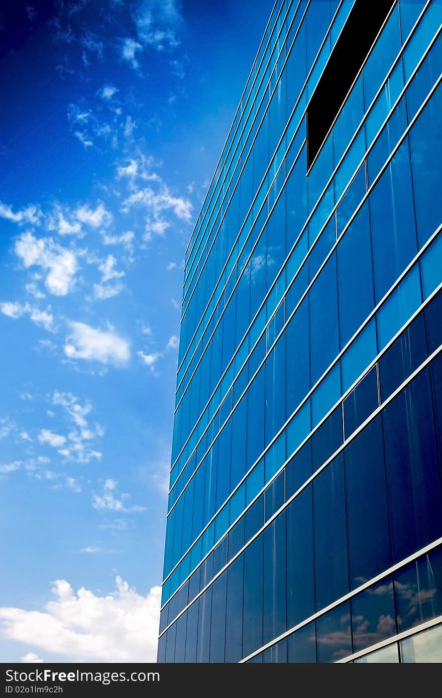 Office building against blue sky. Office building against blue sky