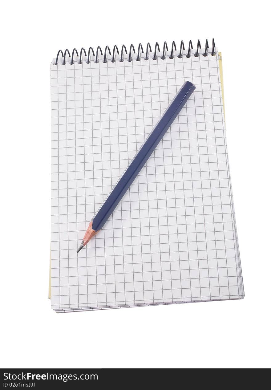 Isolated squared notebook and pen on the white. Isolated squared notebook and pen on the white