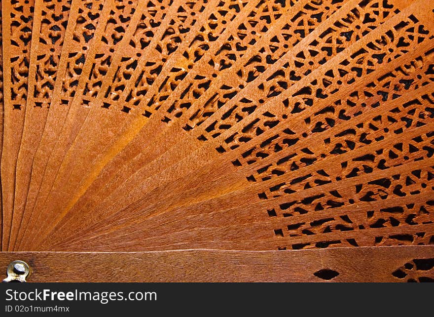 Beautiful brown wooden fan pattern.