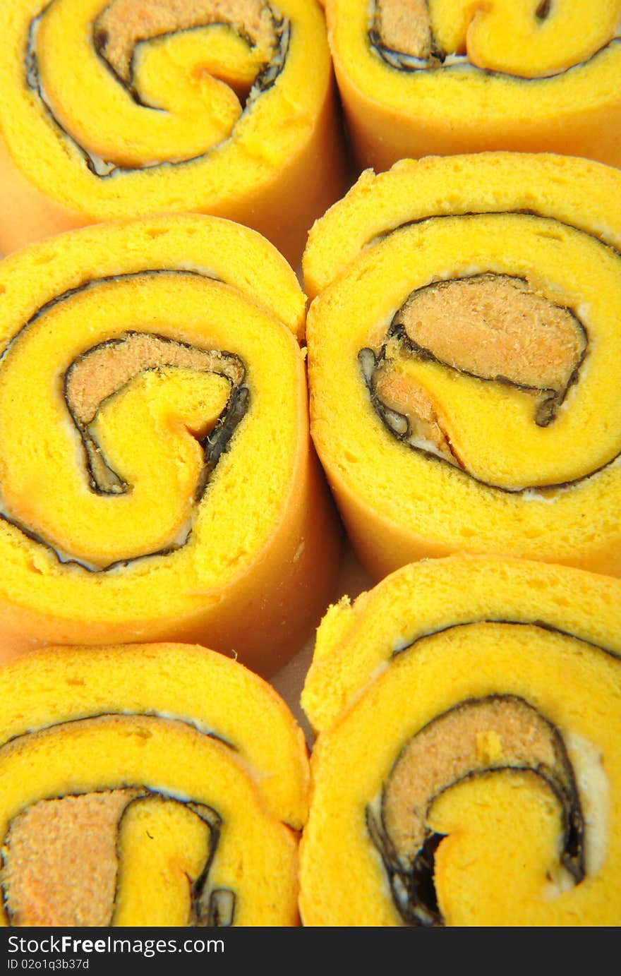 Close-up fresh roll cake background. Close-up fresh roll cake background