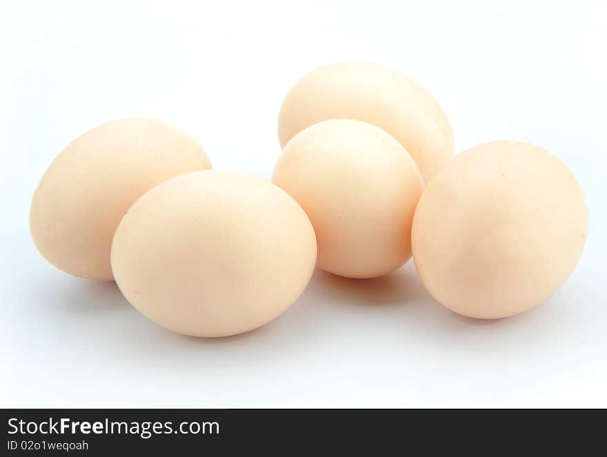 Organic eggs on a white background