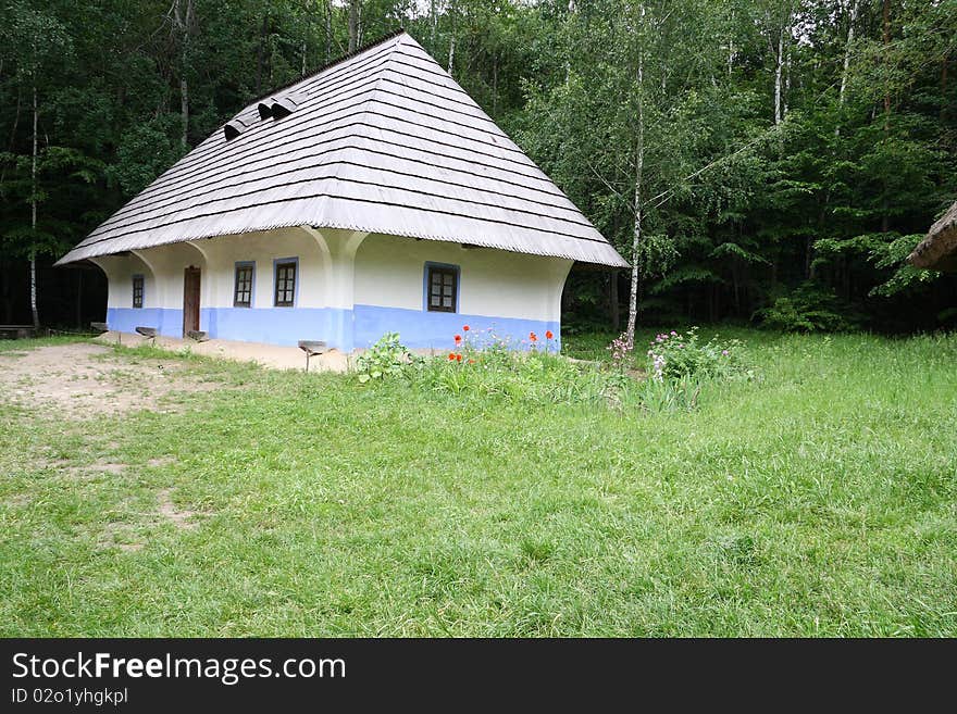 Ukrainian national house among green grass. Ukrainian national house among green grass