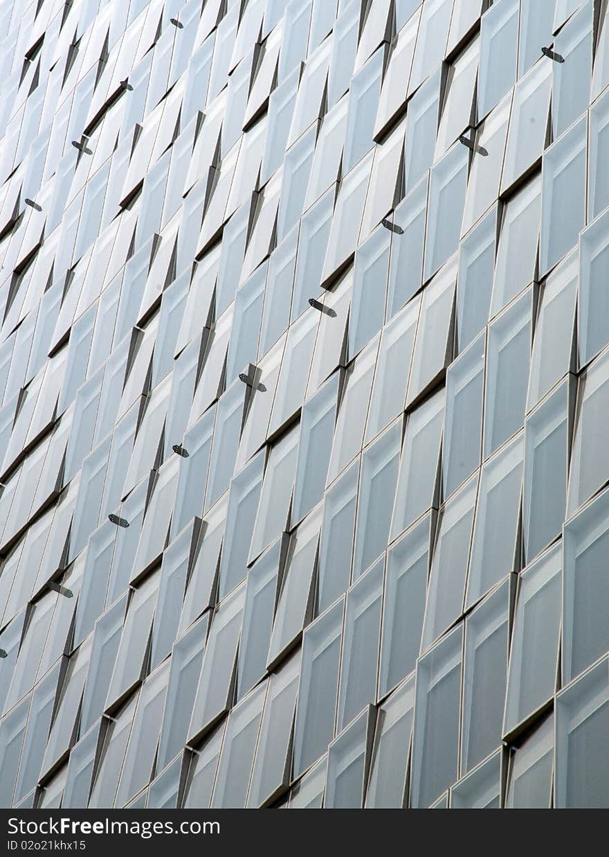 Details of the windows of a modern skyscraper in downtown Milan, Italy. Details of the windows of a modern skyscraper in downtown Milan, Italy.