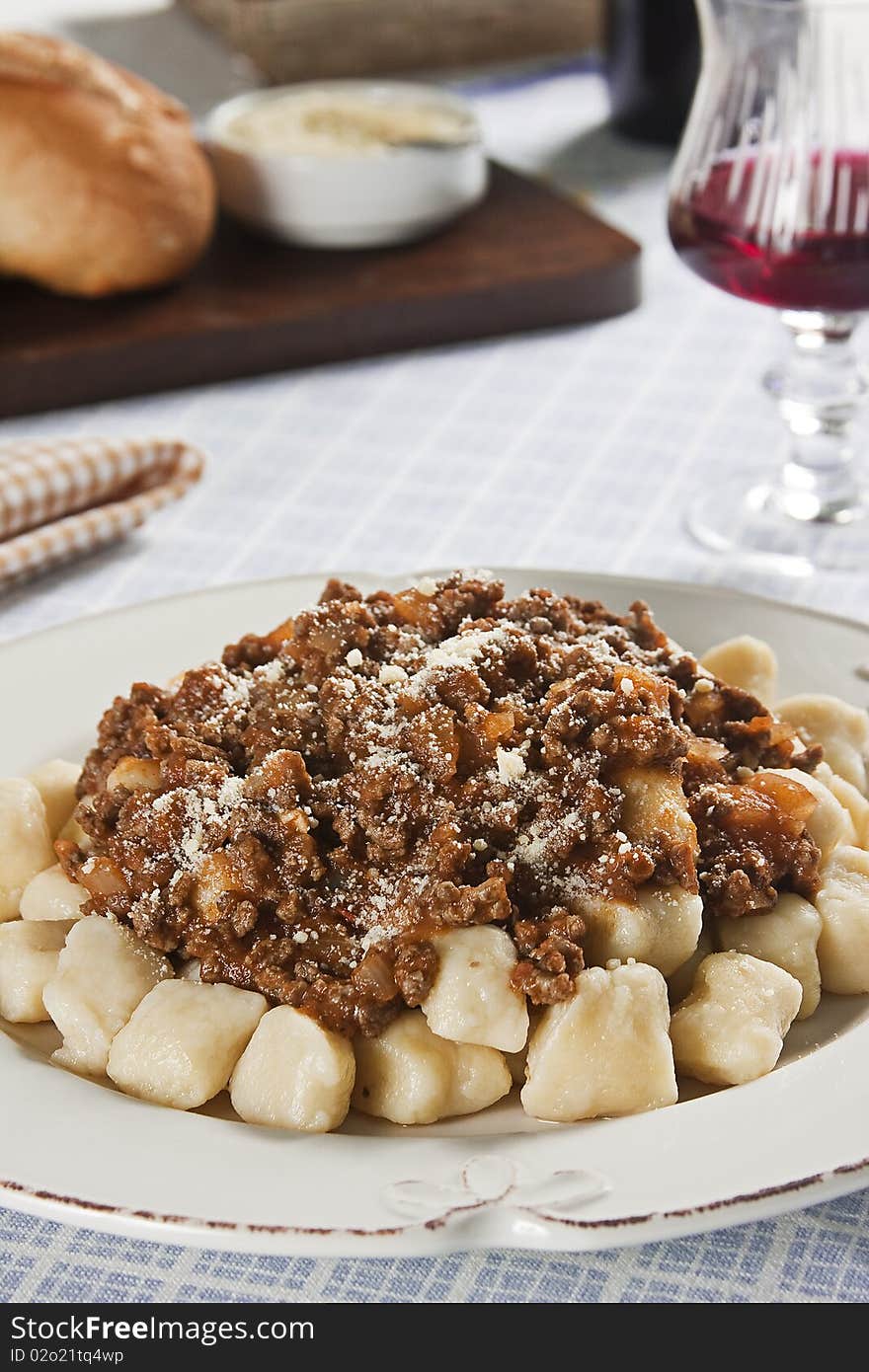 Food photography. Italian cuisine accompanied by bolognese sauce. Food photography. Italian cuisine accompanied by bolognese sauce.