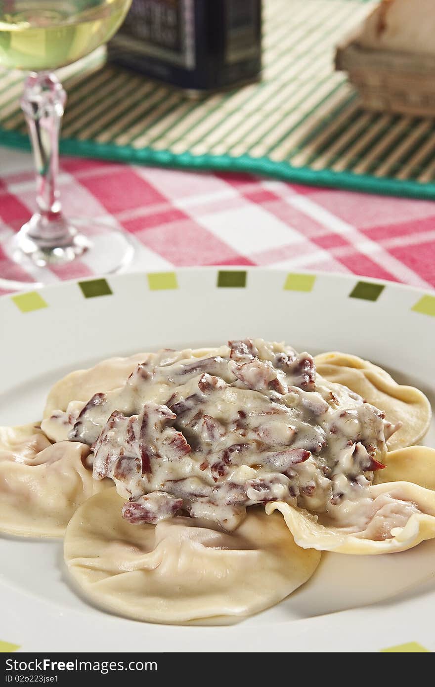 Ravioli with pumpkin sauce.