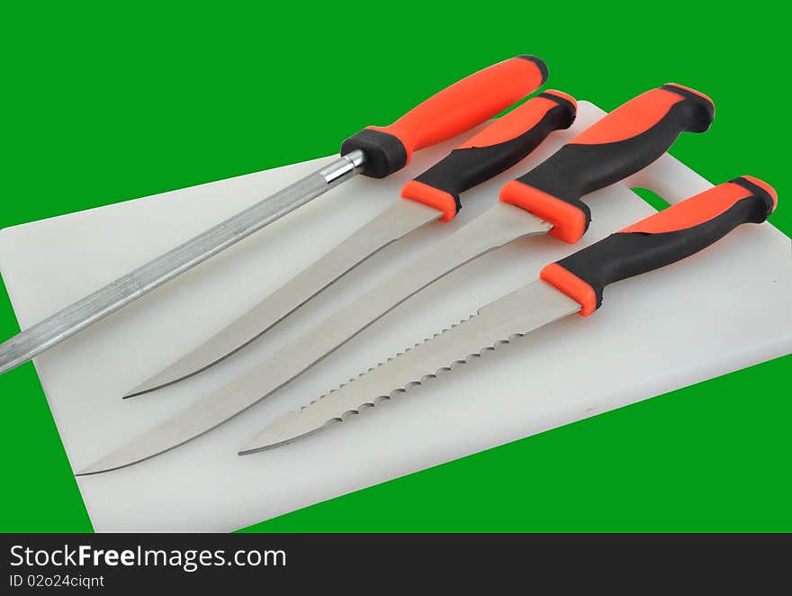 A kitchen knife in the green background