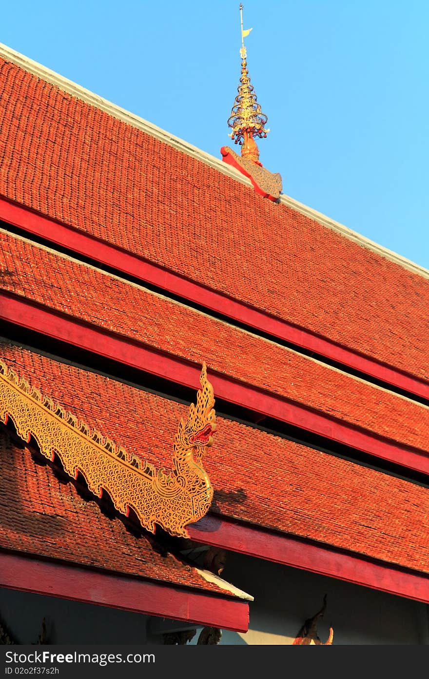 Ornate buddhist decorations on roof of Wat Pho temple in Bangkok.Thailand. Ornate buddhist decorations on roof of Wat Pho temple in Bangkok.Thailand