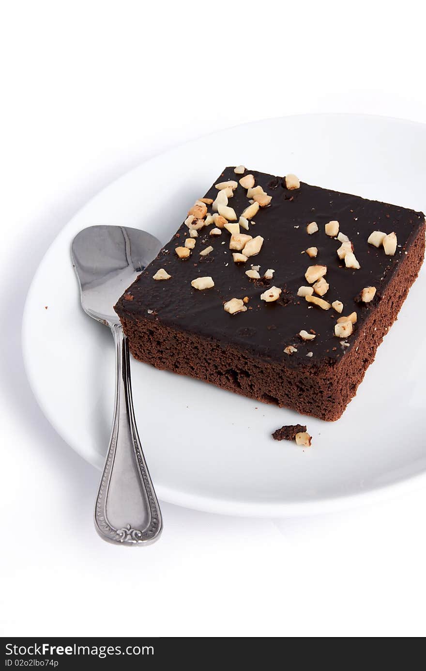 Brownie squares on a isolated white background. Brownie squares on a isolated white background