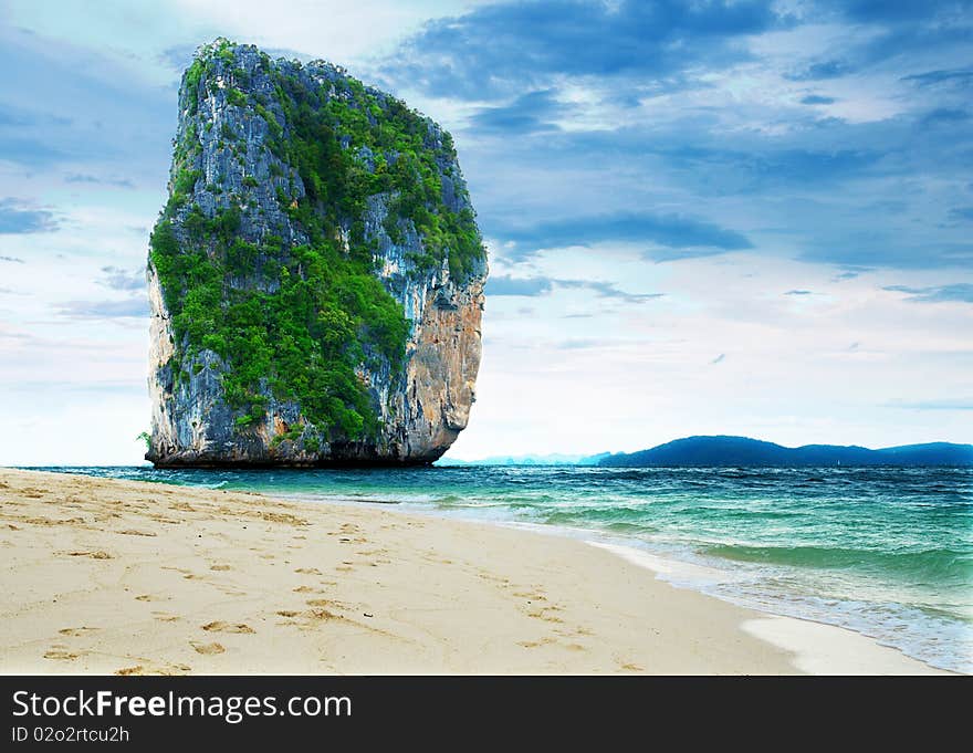 High cliff on Poda island. Exotic tropical landscape. High cliff on Poda island. Exotic tropical landscape.