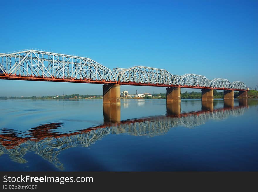 Railway bridge through the river