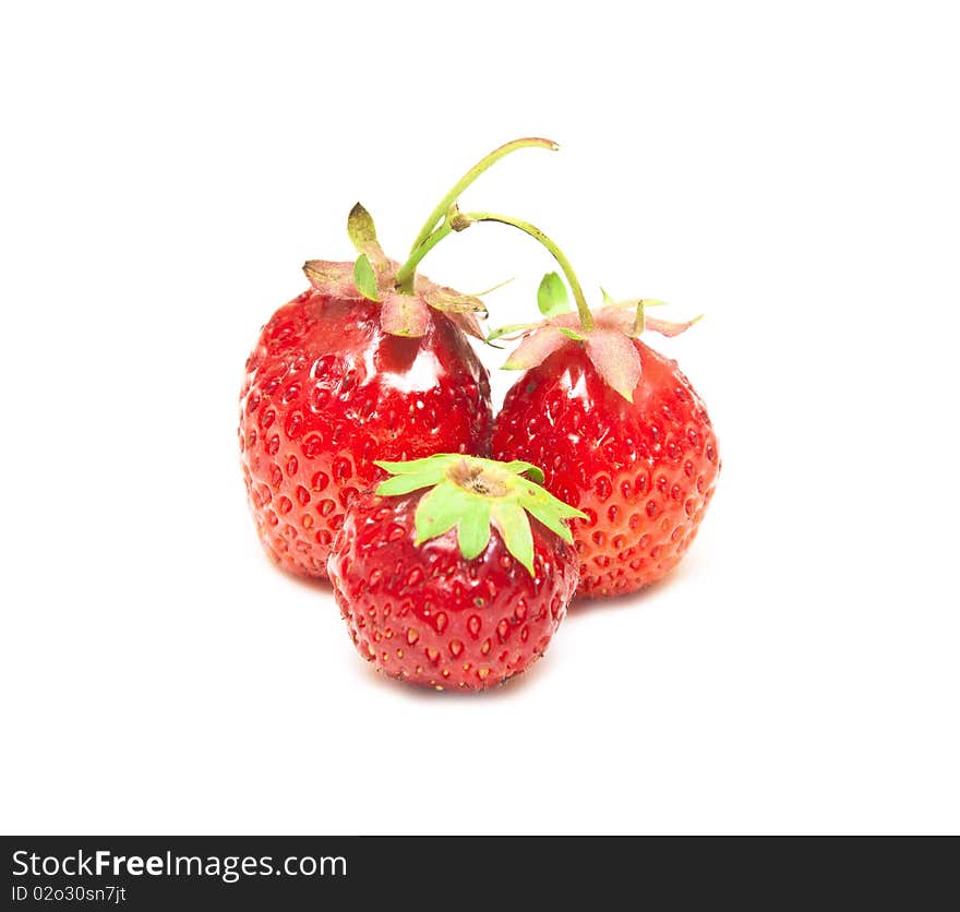 Fruits of red strawberry isolated on white background