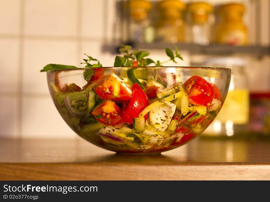 Salad In Glass Dish In The Kitchen