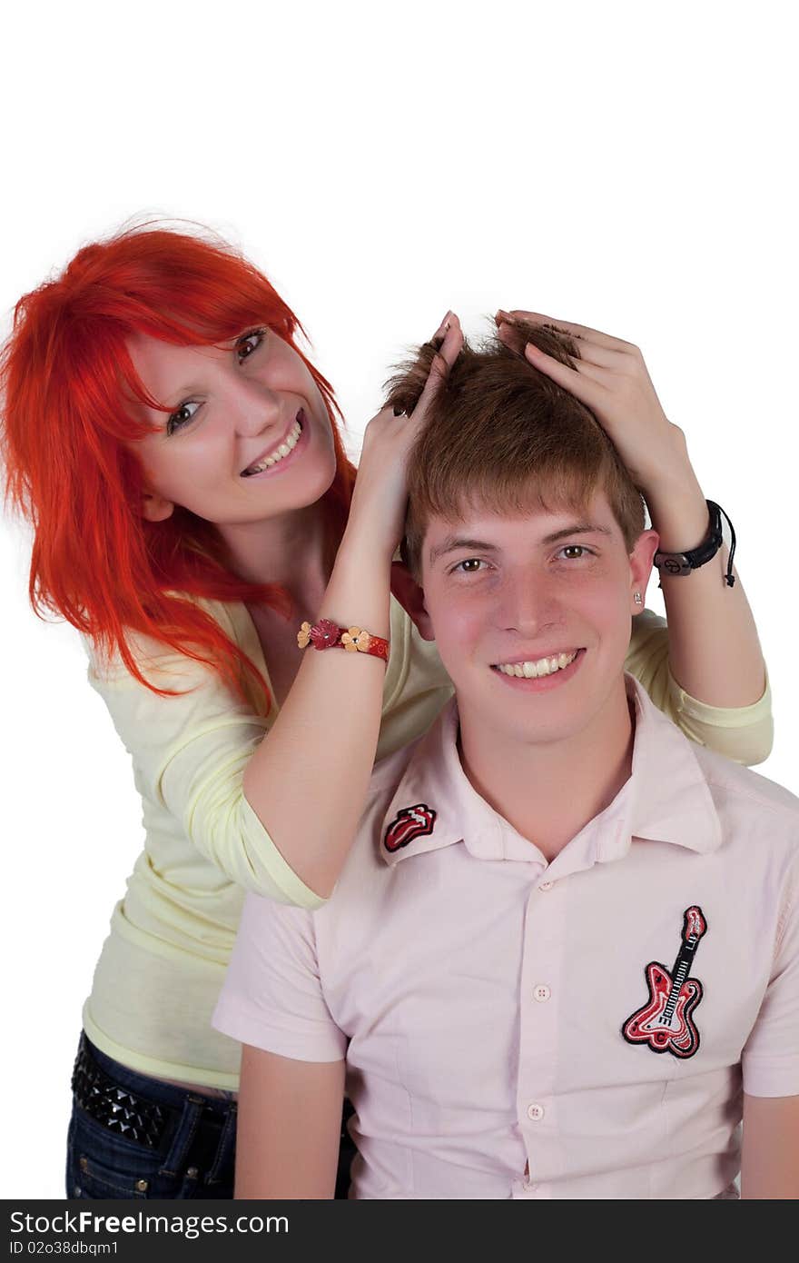 Girl and boy posing on a white background. Girl and boy posing on a white background