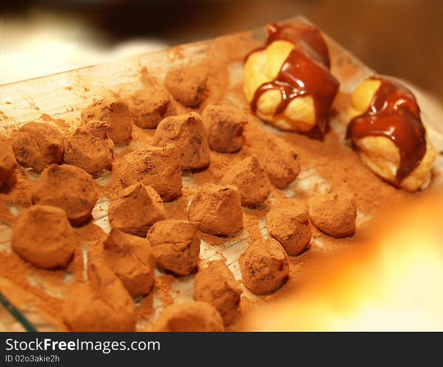 Plate of Chocolate Truffles and eclaire