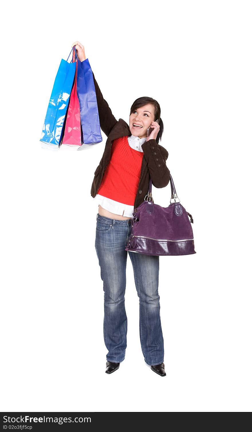 Young adult woman with shopping bags