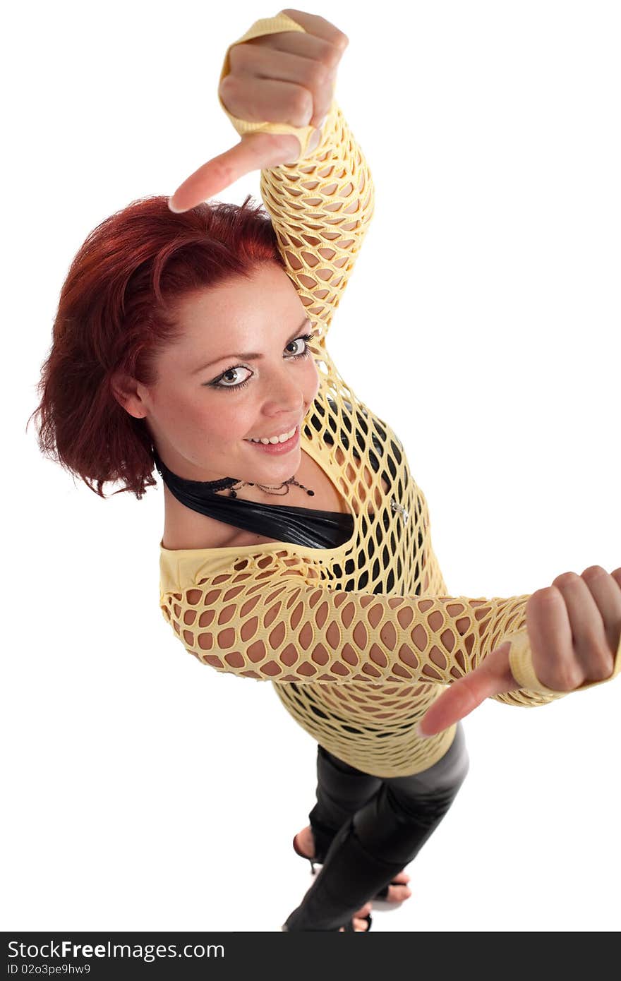 Young beautiful fashion model with red hair and a fishnet shirt. Young beautiful fashion model with red hair and a fishnet shirt.