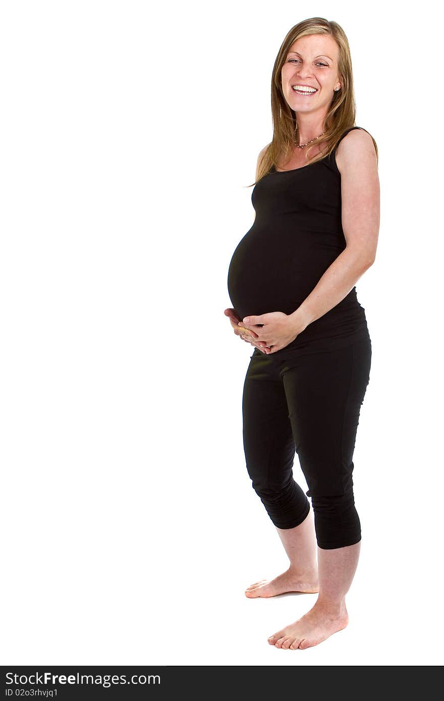 Young beautiful pregnant woman isolated over white background. Young beautiful pregnant woman isolated over white background.