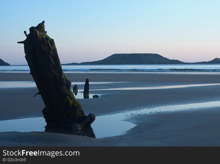 Early morning sunrise over a calm ocean in the summertime. Early morning sunrise over a calm ocean in the summertime