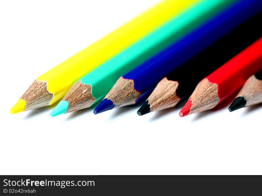 White background with colorfull pencils