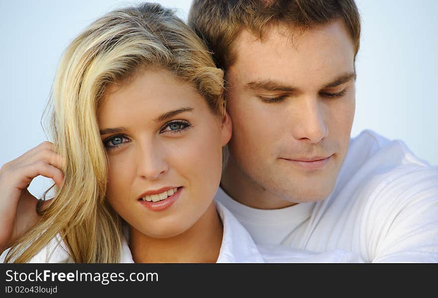 Lovely closeup portrait of an attractive young couple. Lovely closeup portrait of an attractive young couple