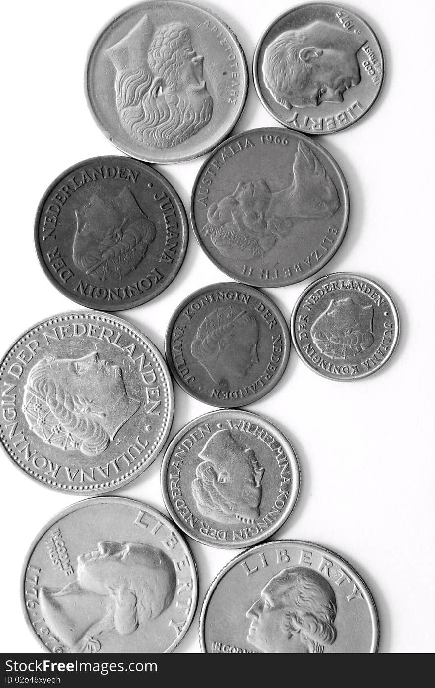 Different metal silver coins over white