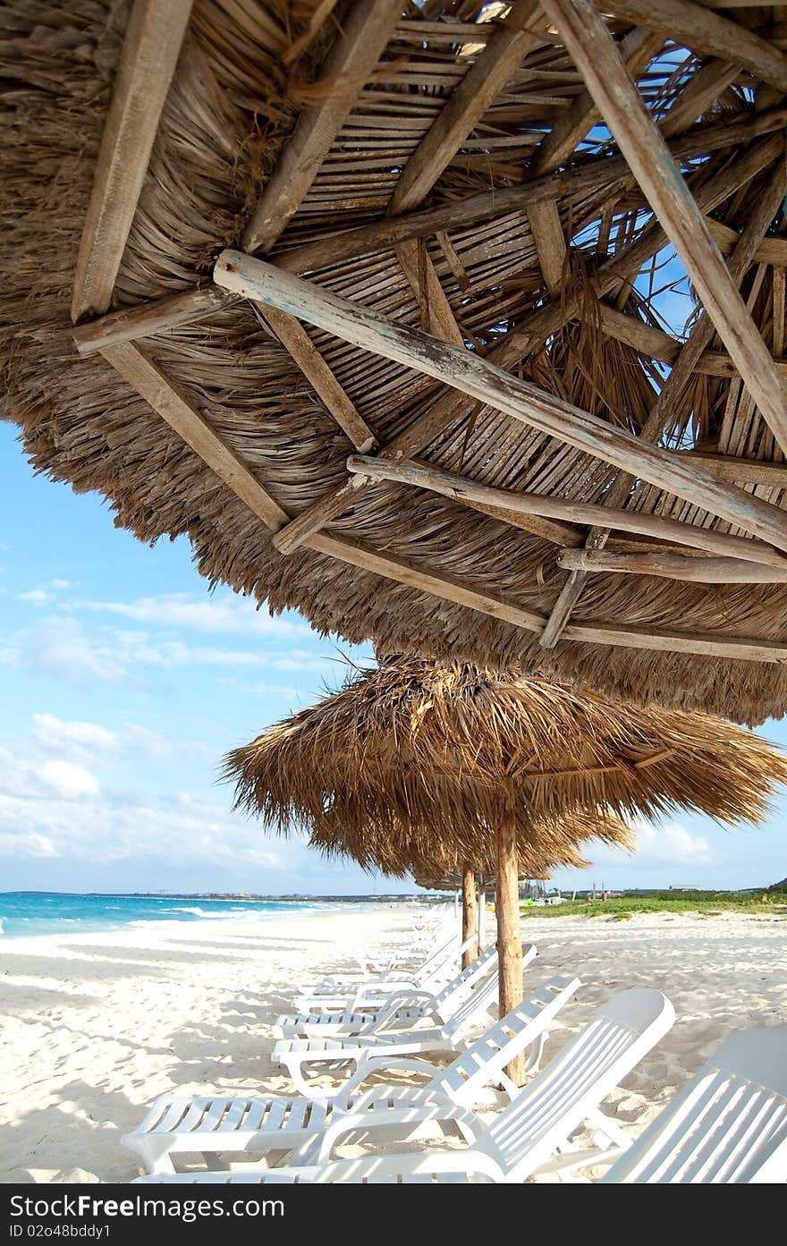 View of Cuban beach under the umbrellas. View of Cuban beach under the umbrellas.