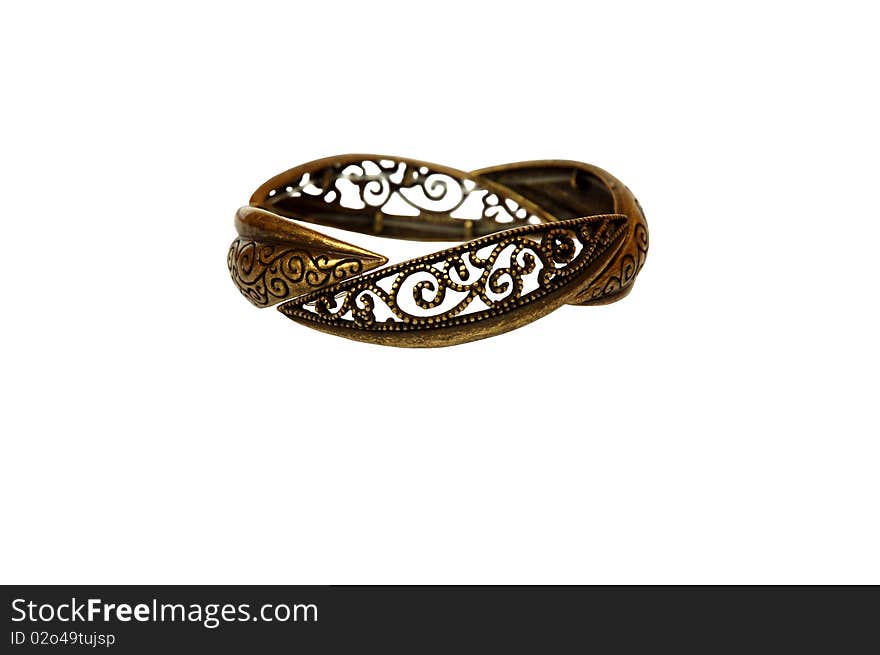 Golden metal bracelet with a beautiful carving