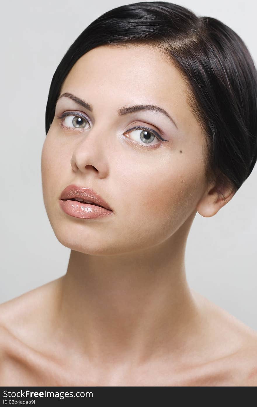 Closeup of a young beautiful woman. Closeup of a young beautiful woman.