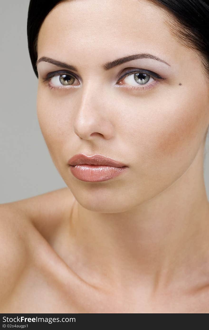 Closeup of a young beautiful woman. Closeup of a young beautiful woman.