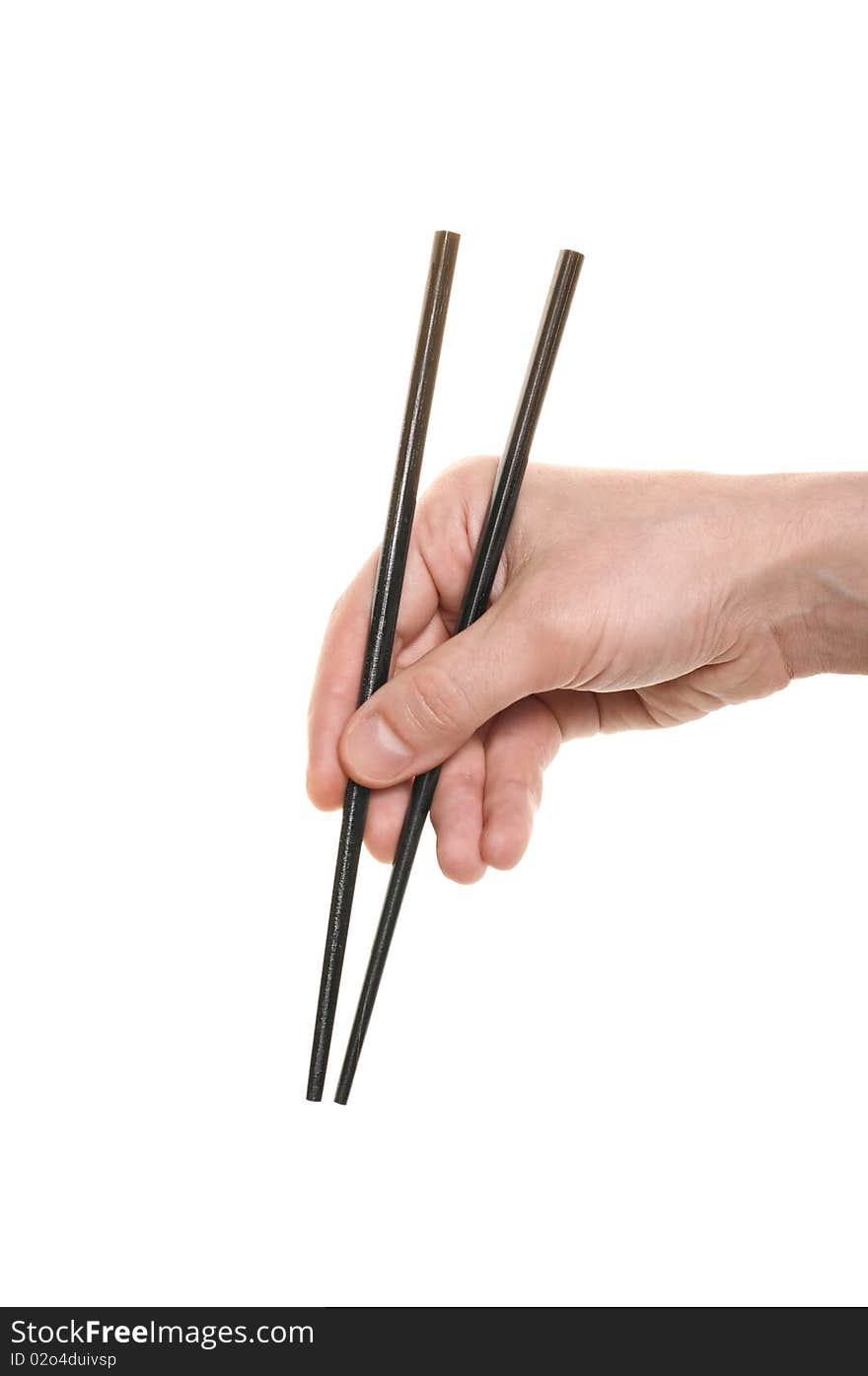 Hand with a chopsticks isolated over white