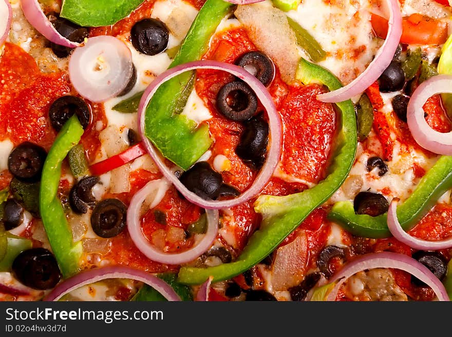 Pizza with vegetables and pepperoni